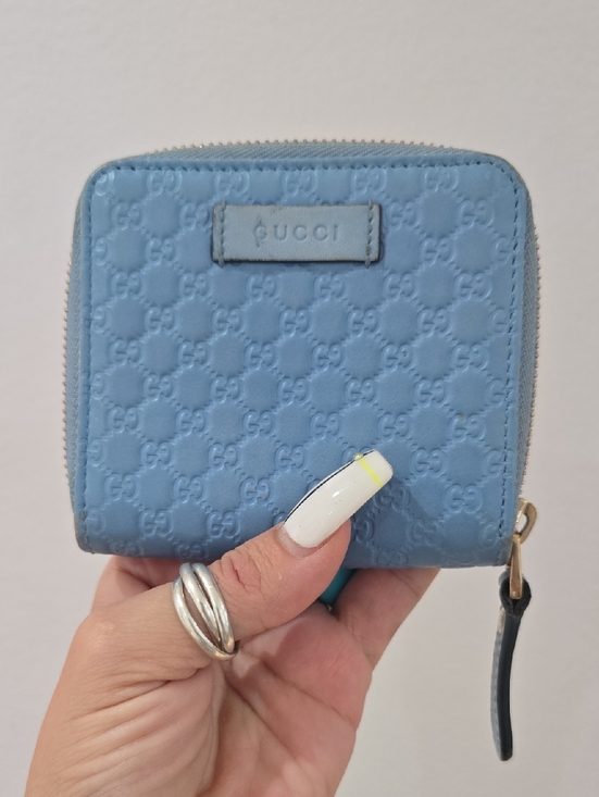 Gucci Handbags - Gucci Light Blue GG Embossed Zip Around Wallet